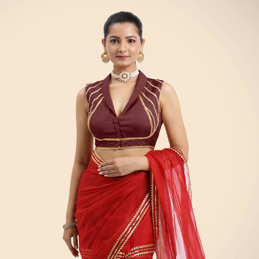 Avni x Tyohaar | Burgundy Sleeveless FlexiFit™ Saree Blouse with Elegant Shawl Collar with Golden Gota Lace Embellishment